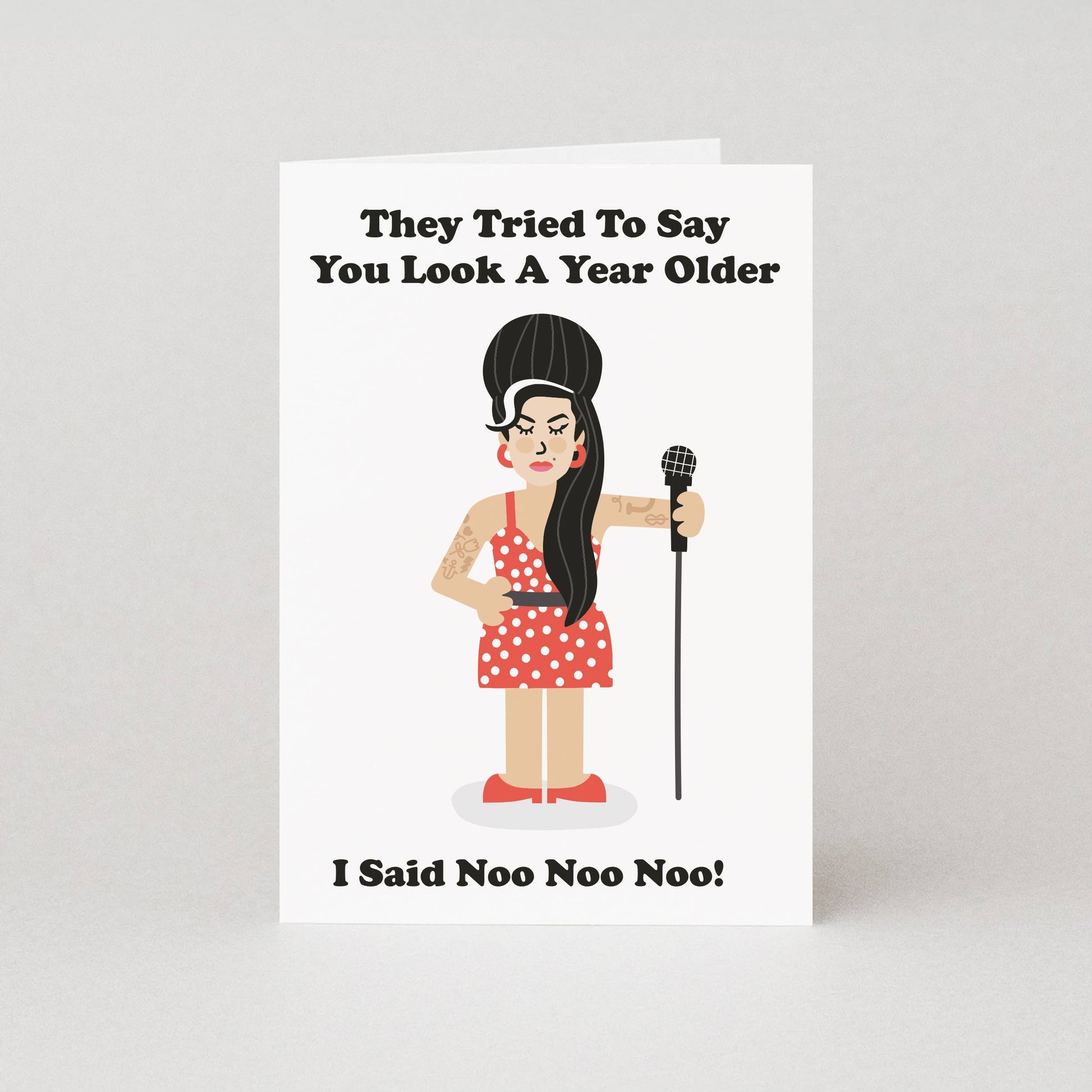 This birthday card features an illustration of a famous blues singer taking a twist on her classic, changing the lyrics to "They Tried To Say You Look A Year Older, I said Noo Noo Noo!", resulting in a perfect gift for fans of the late singer. The birthday card for her is blank on the inside, ready to pen a personal handwritten message.