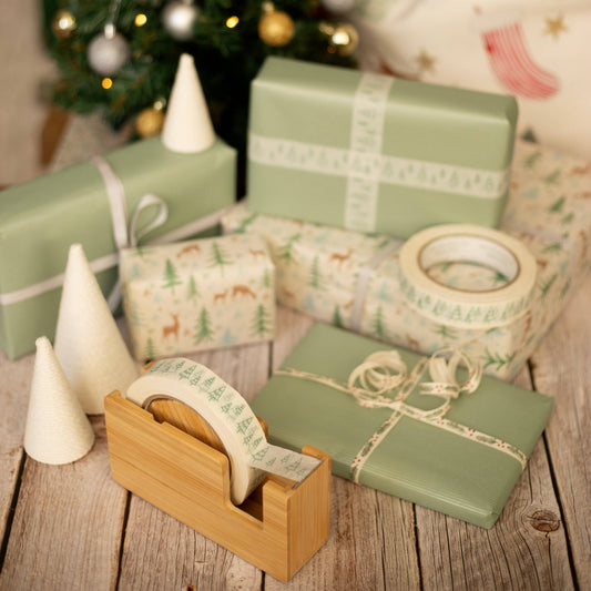 Green Christmas Tree Paper Tape on white kraft, 24mm x 50m, vegan ink, plant-based adhesive, plastic-free recyclable gift wrap tape.
