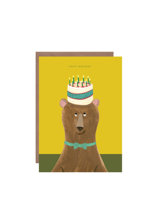 Hand-illustrated 'Cake on Bear' birthday card with bear and cake, “HAPPY BIRTHDAY”, UK made, sustainable, 5x7in.