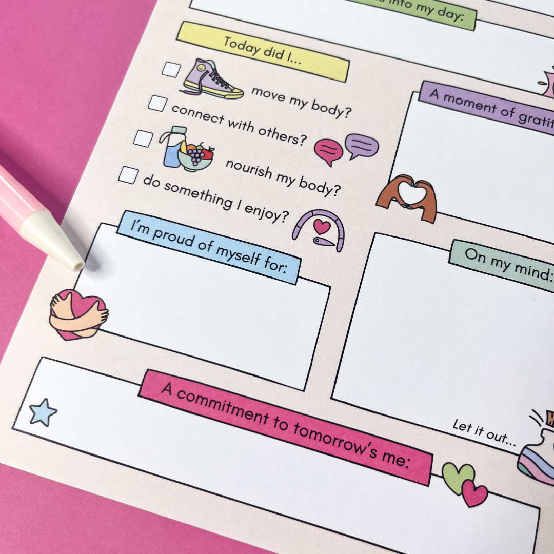 Daily Focus Notepad on a wooden desk