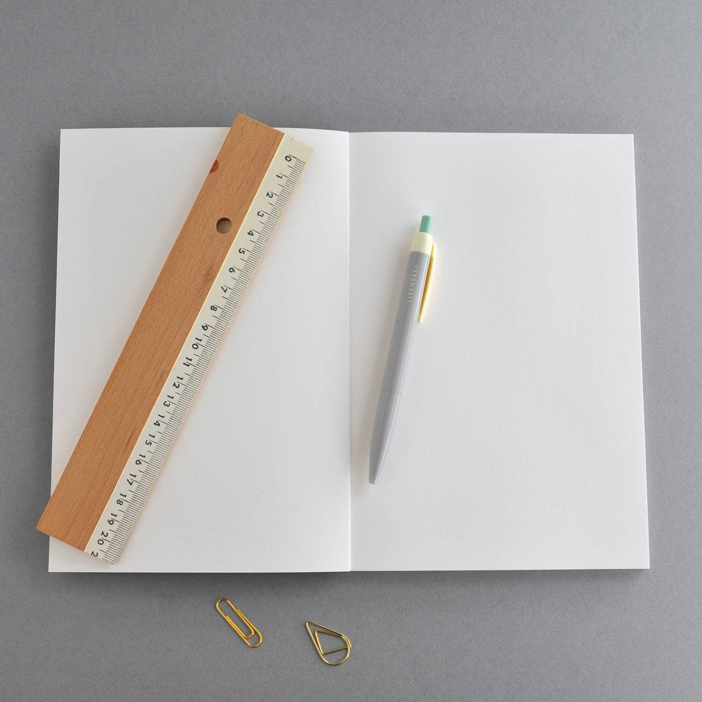 Lifestyle shot of Botanics Flora notebook on a desk