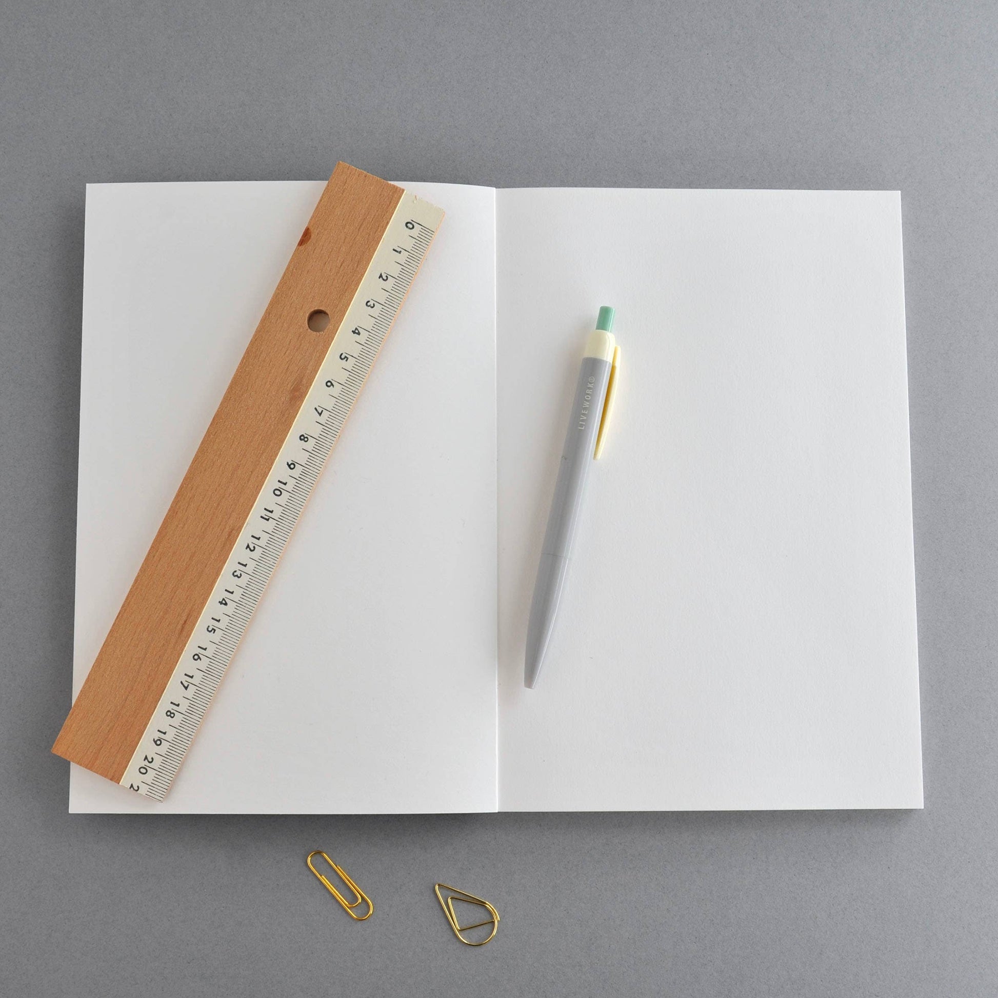 Lifestyle shot of Botanics Flora notebook on a desk