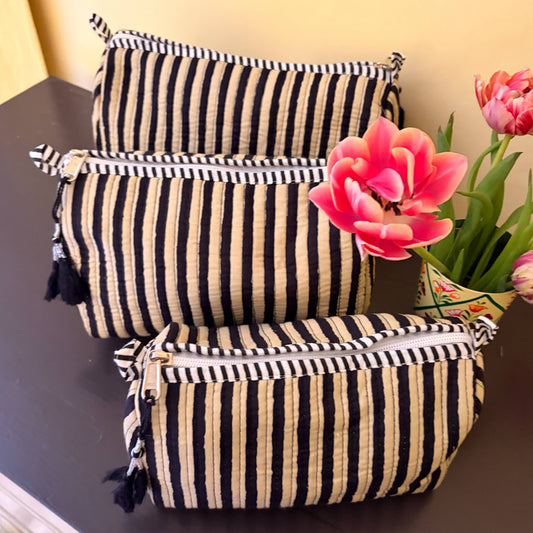 Handmade striped makeup bag in small, medium, and large sizes