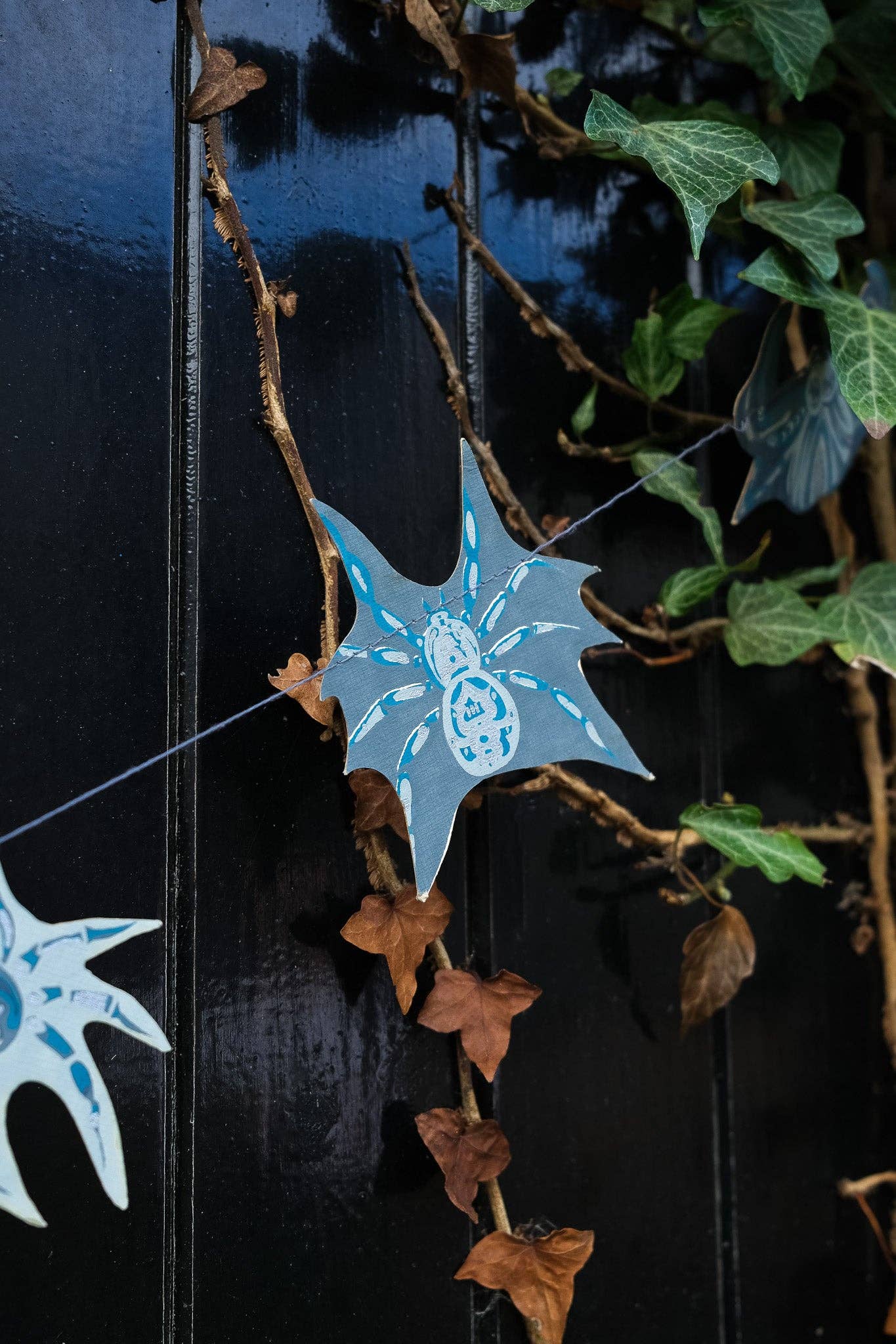 Hand-sewn recycled Halloween garland with 20 spooky screen-printed spiders