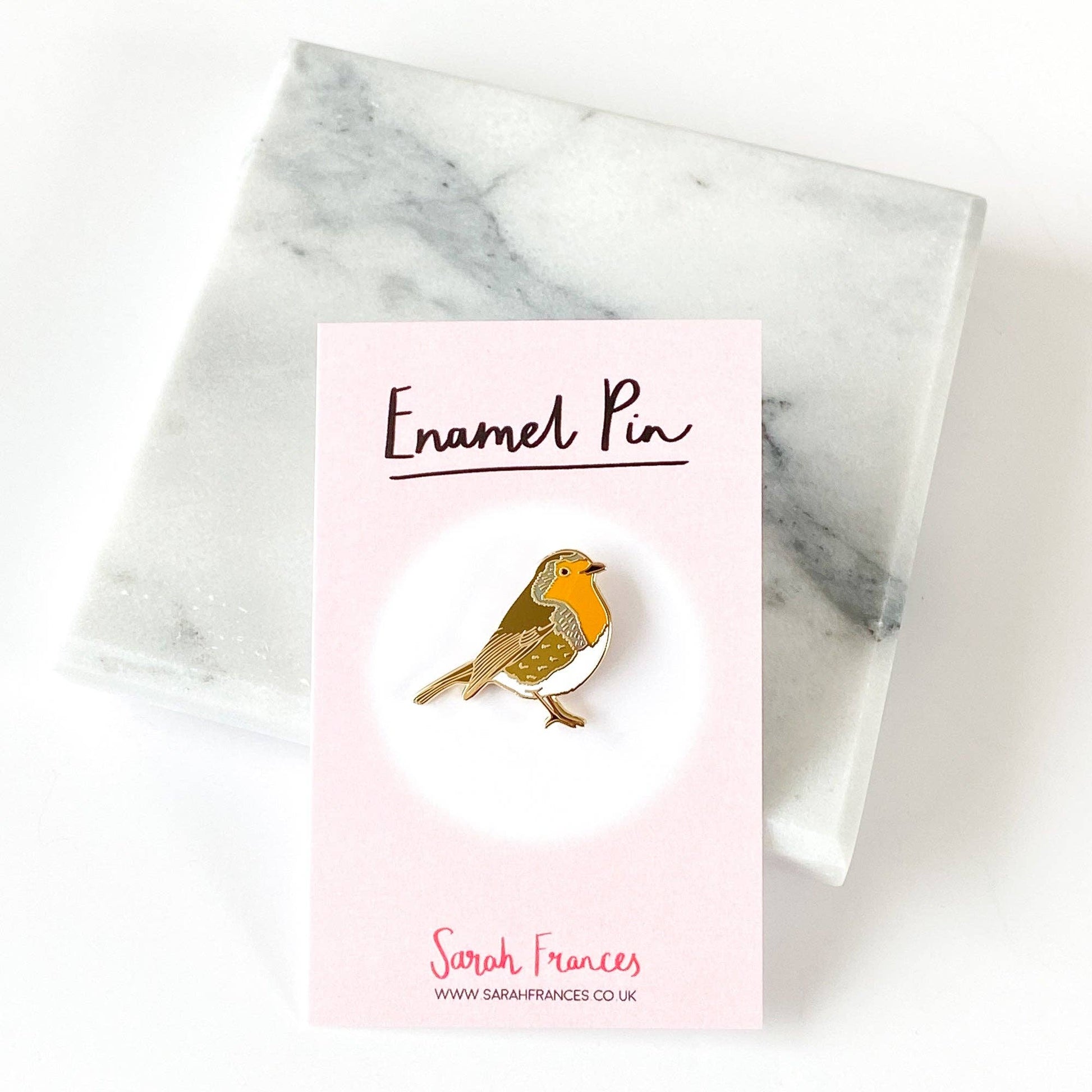 Robin enamel pin, gold metal and hard enamel, 1 inch wide, designed by Sarah Frances