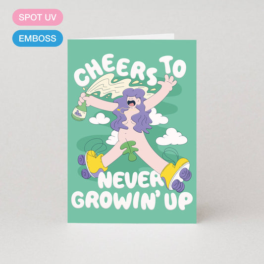 Colourful “Never Growin Up” birthday card featuring pop-art skateboard design, foil accents, textured finish, UK made.