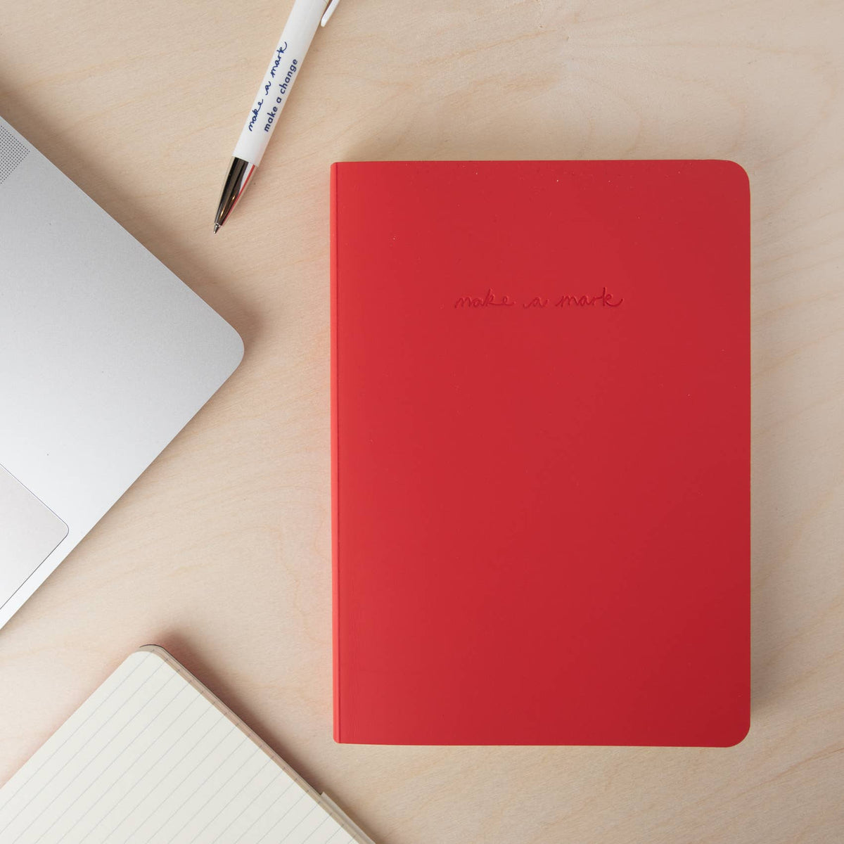 Inside pages of off-white lined sustainably sourced paper notebook