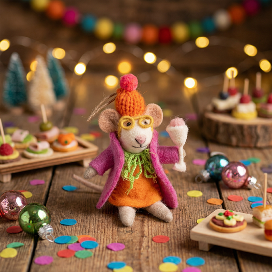 Close up of needle felt Christmas mouse with glasses and knitted bobble hat