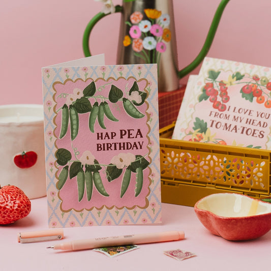 Close up of the vintage floral and pea pod illustration on textured card