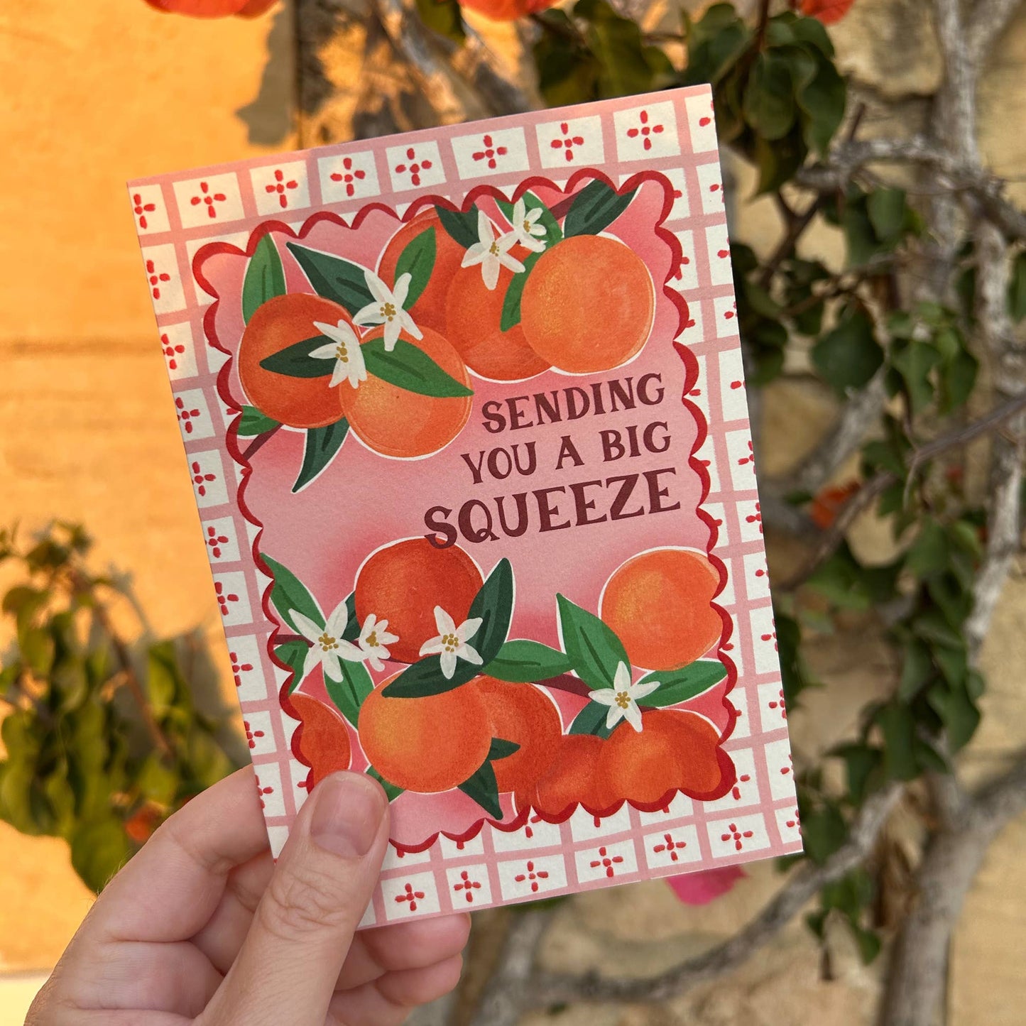 Textured detail of the premium Tintoretto Gesso card used for 'Big Squeeze' orange greeting card