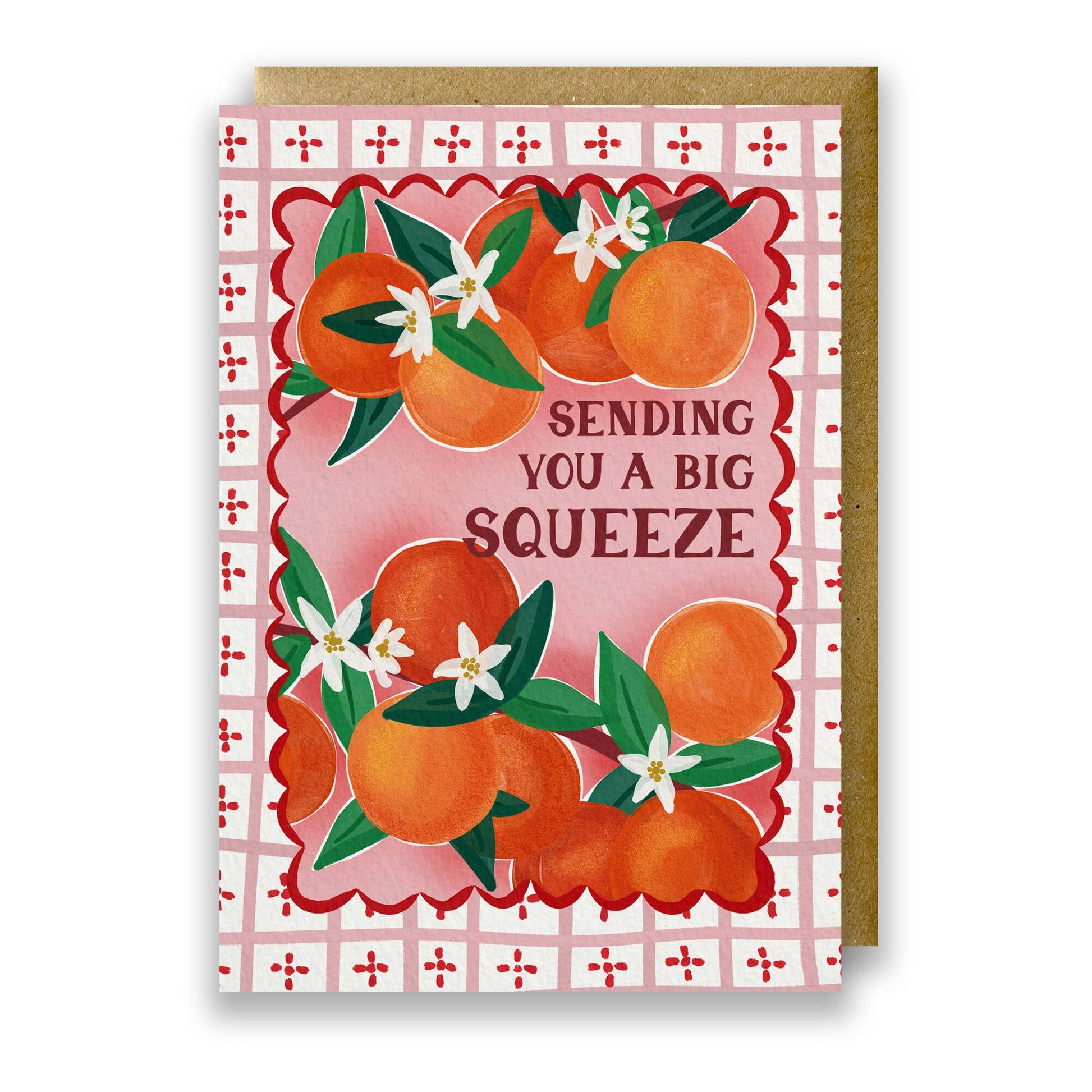 A6 'Sending you a big squeeze' orange greeting card with Italian tile background and kraft envelope