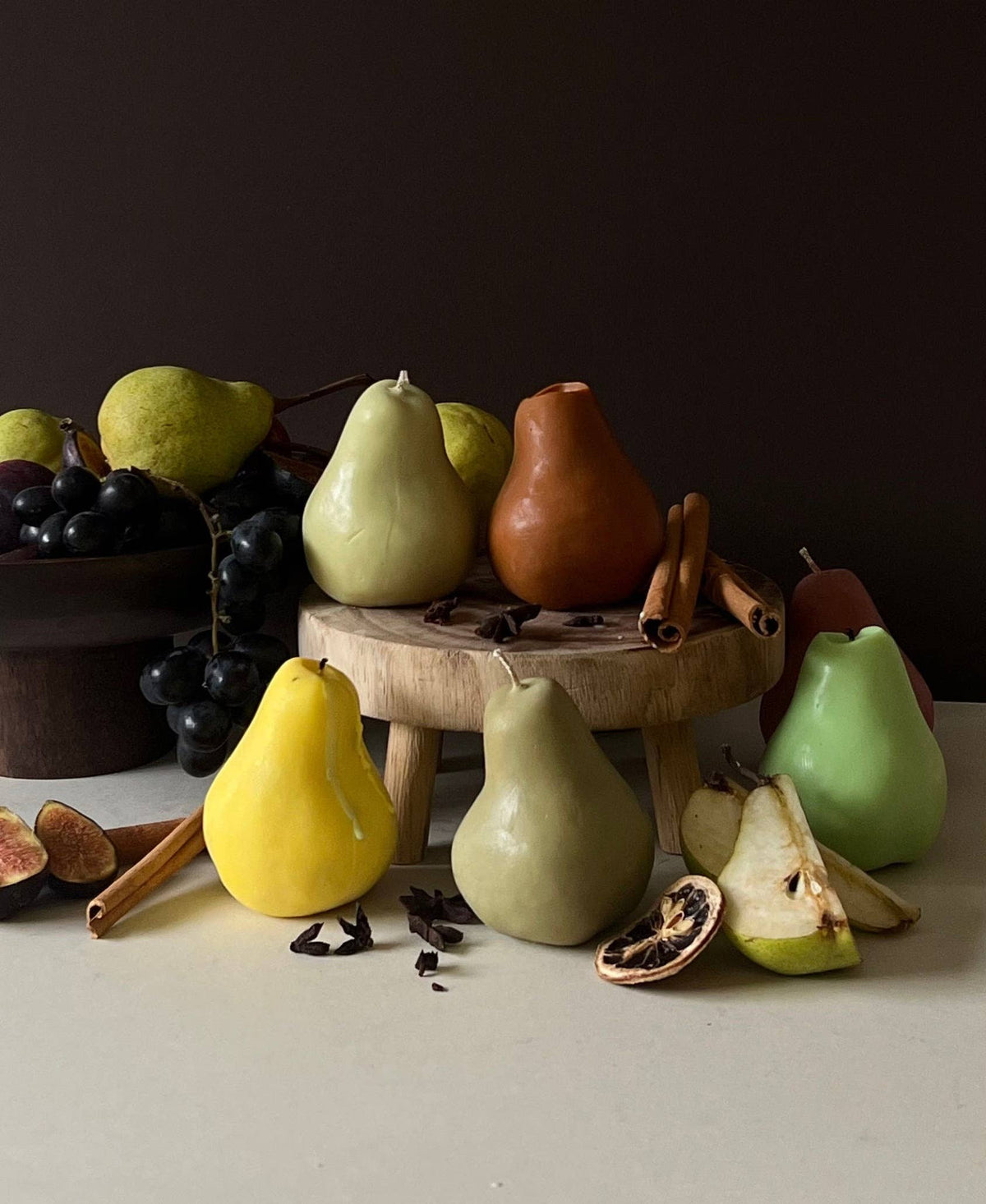 Stylish pear fruit candle on display
