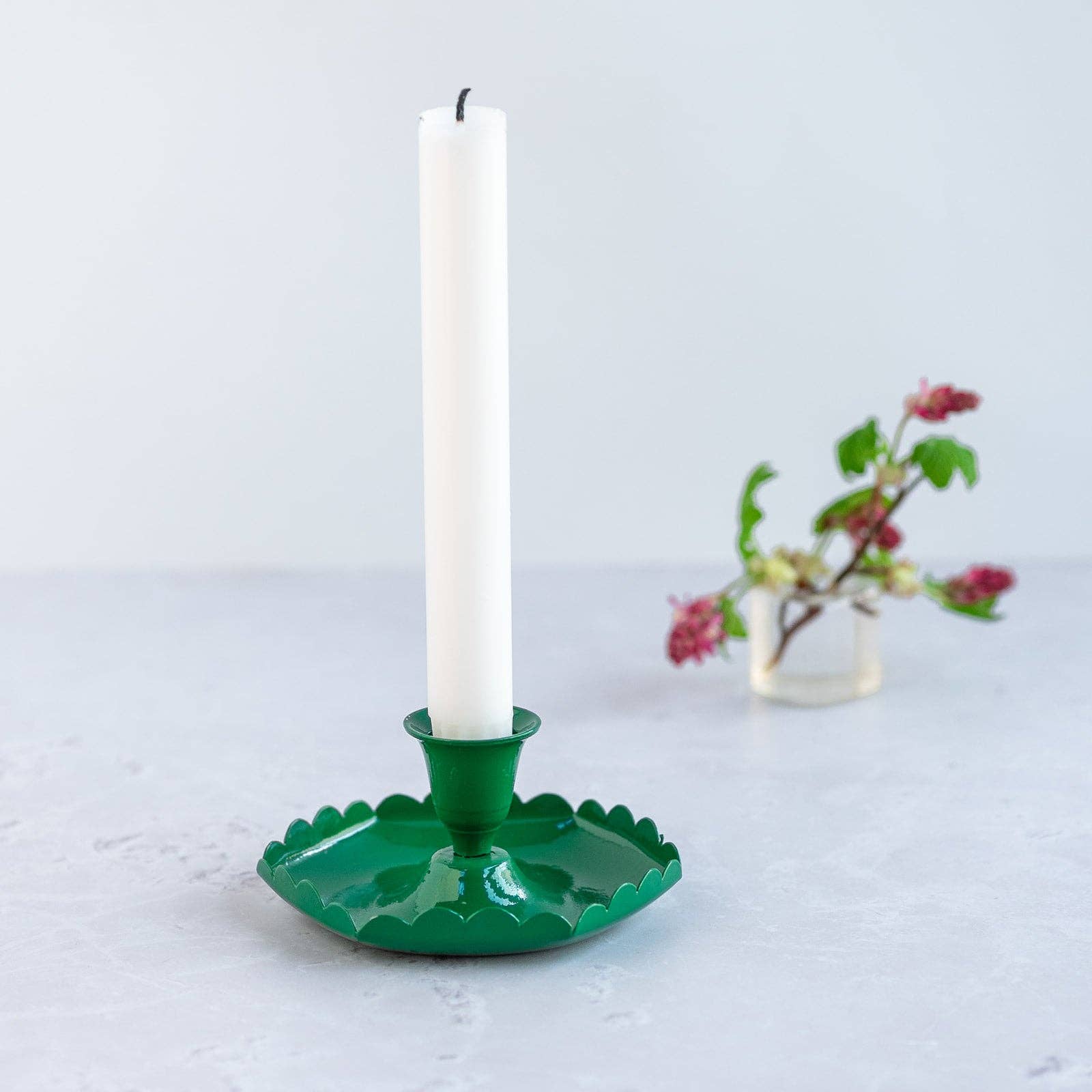 Emerald green handmade candlestick holder with scalloped edge