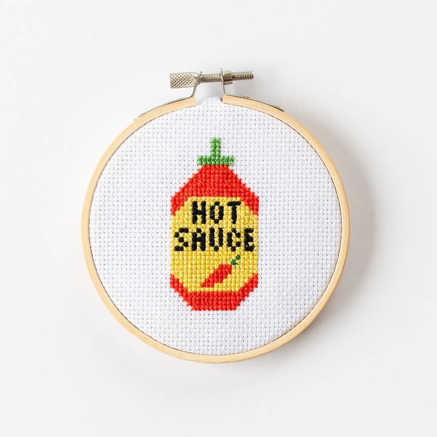Step-by-step instructions and pattern chart for cross stitch