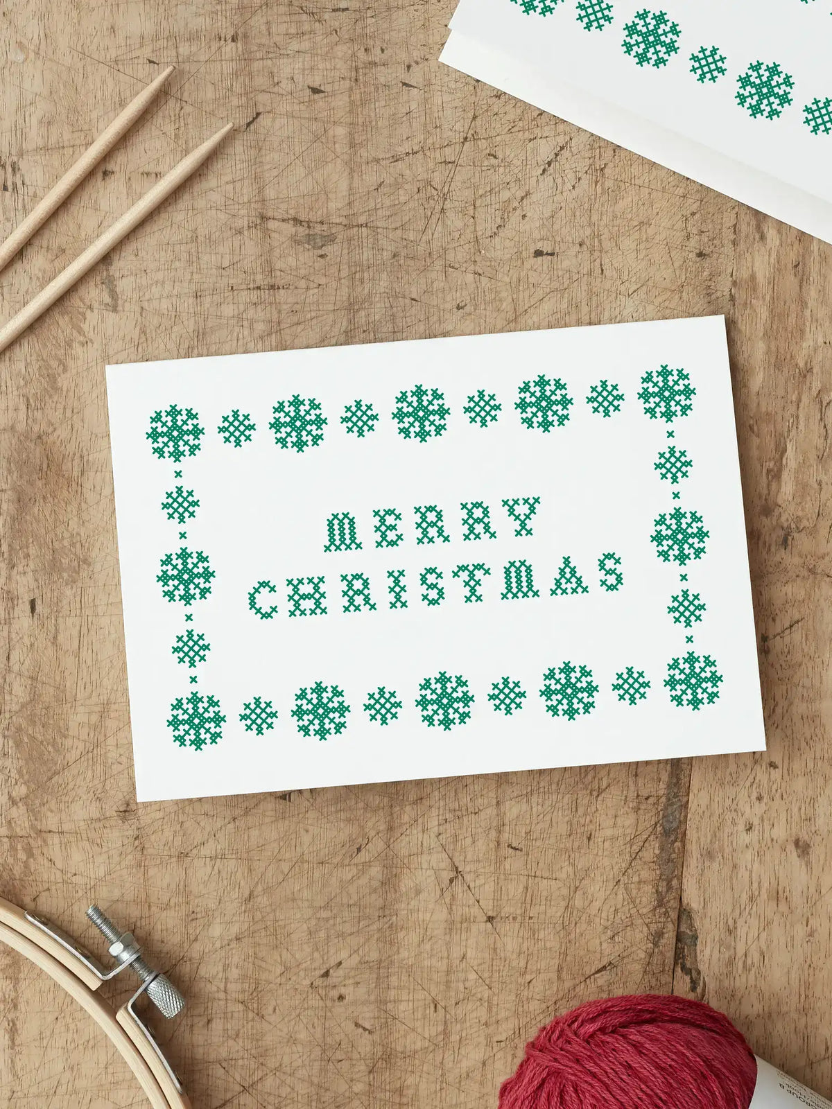 Green screen printed Merry Christmas cross stitch card