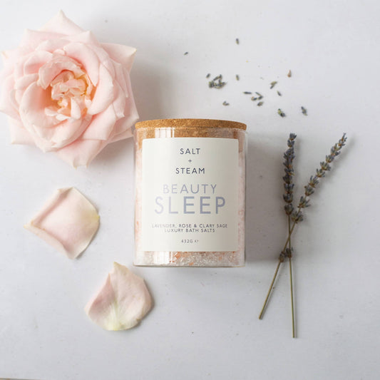Beauty Sleep Lavender Rose and Clary Sage bath salts in glass jar.