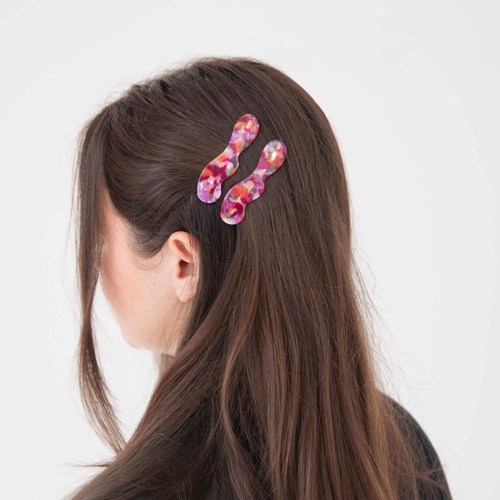 Back view of berry hair slides set