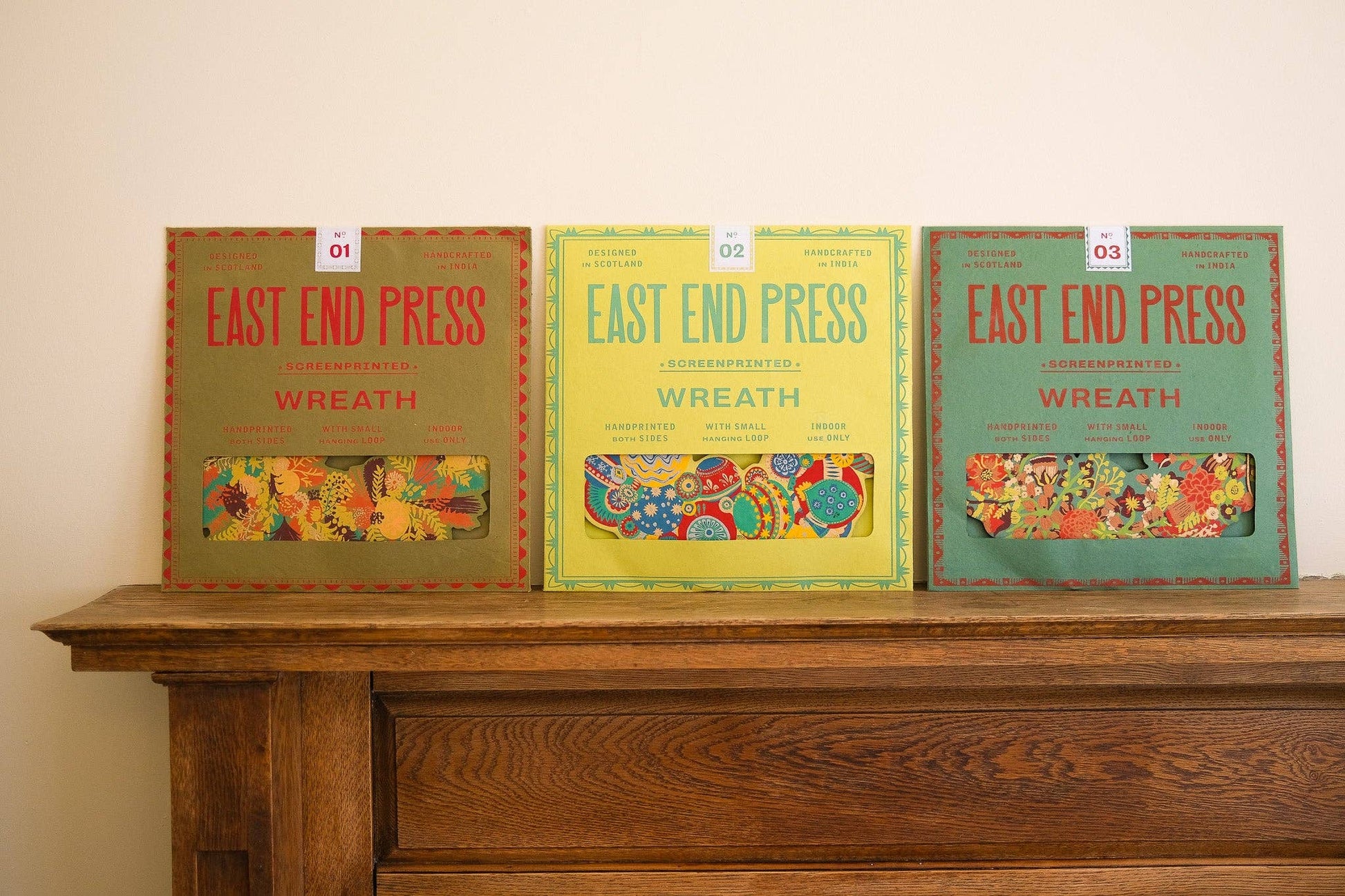 Hand-printed Colourful Bauble Cotton Board Wreath by East End Press with hanging loop, sustainable ornament