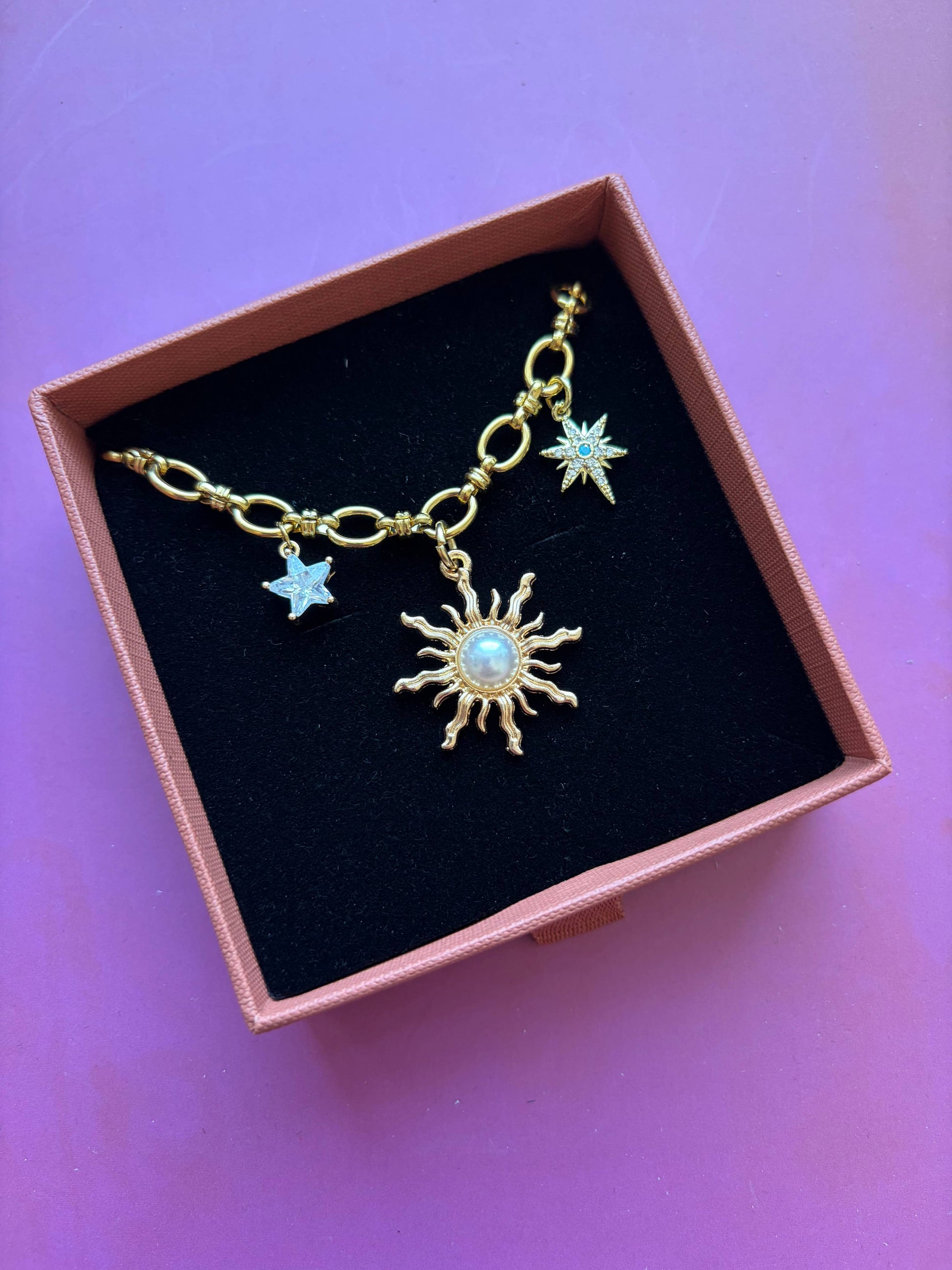 Chunky gold chain necklace with cubic zirconia stars