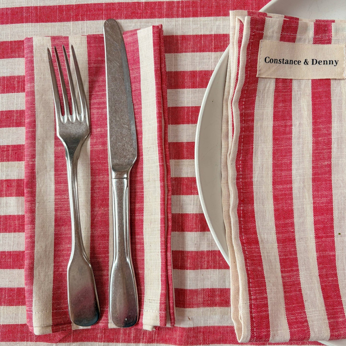 Woven Poppy Stripe Cotton Napkins Set of 4 on a styled table