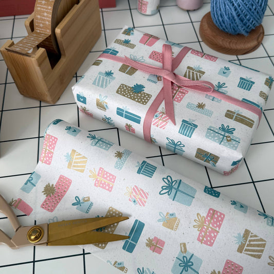 5m roll of eco-friendly present-design wrapping paper, 500mm wide, 100% recycled kraft, sustainably sourced, recyclable.