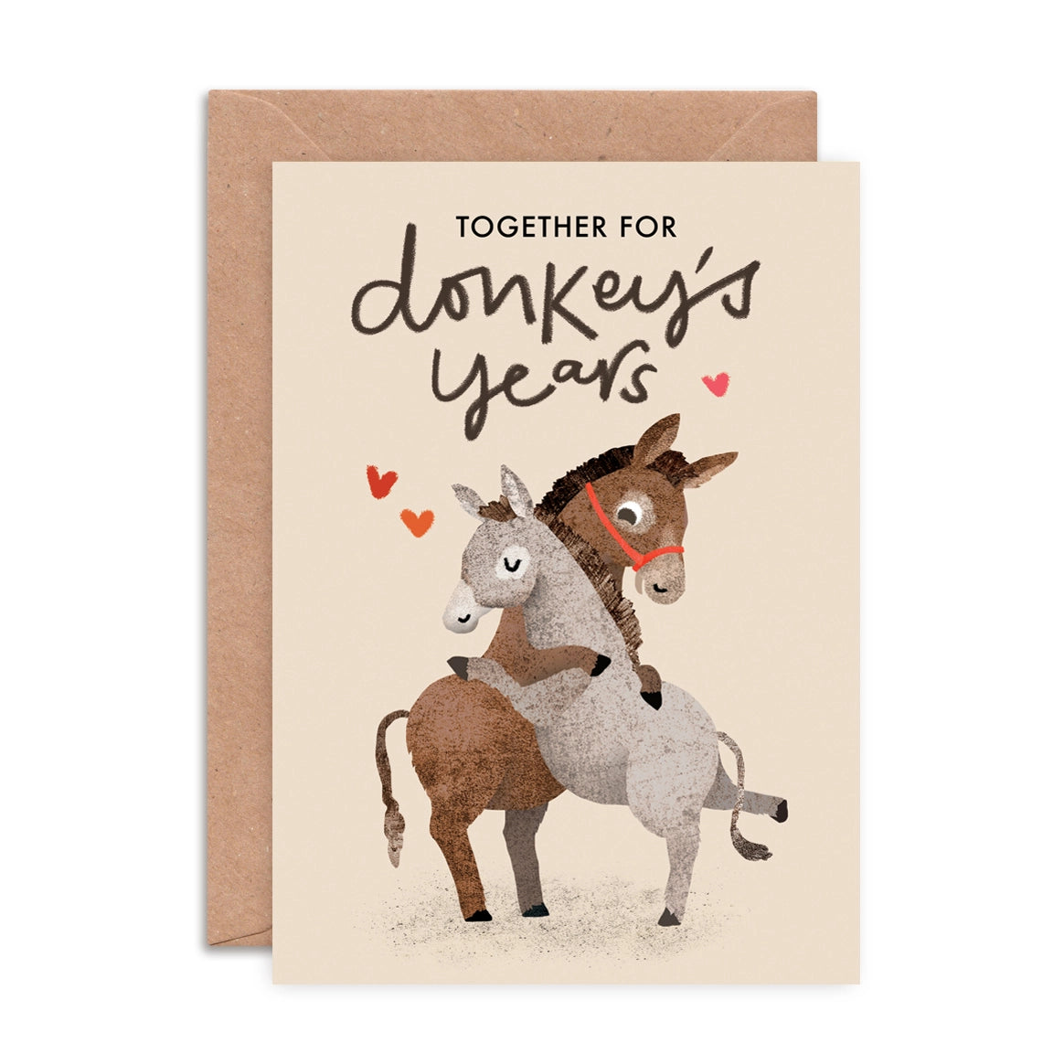 A6 Donkey's Years greeting card by Emily Nash, featuring a colourful donkey illustration, printed on sustainably sourced matte card with a recycled kraft envelope.