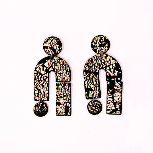 Pair of All that Glitters statement earrings, black polymer clay with gold shimmer, 9cm long, 4cm wide, silver-plated nickel-free hooks.