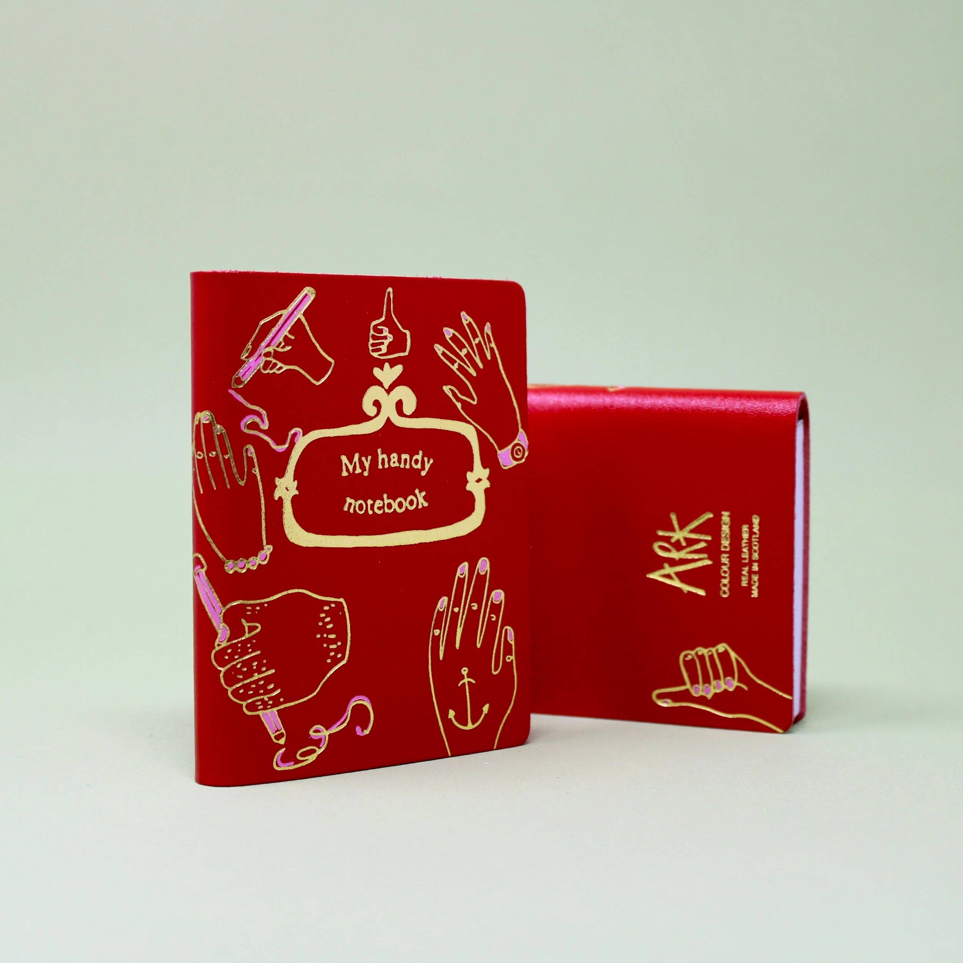 Midi leather journal with gold foil illustration, handmade in Scotland using ethical leather by Ark Colour Design. Red leather gold embossed My handy cookbook.
