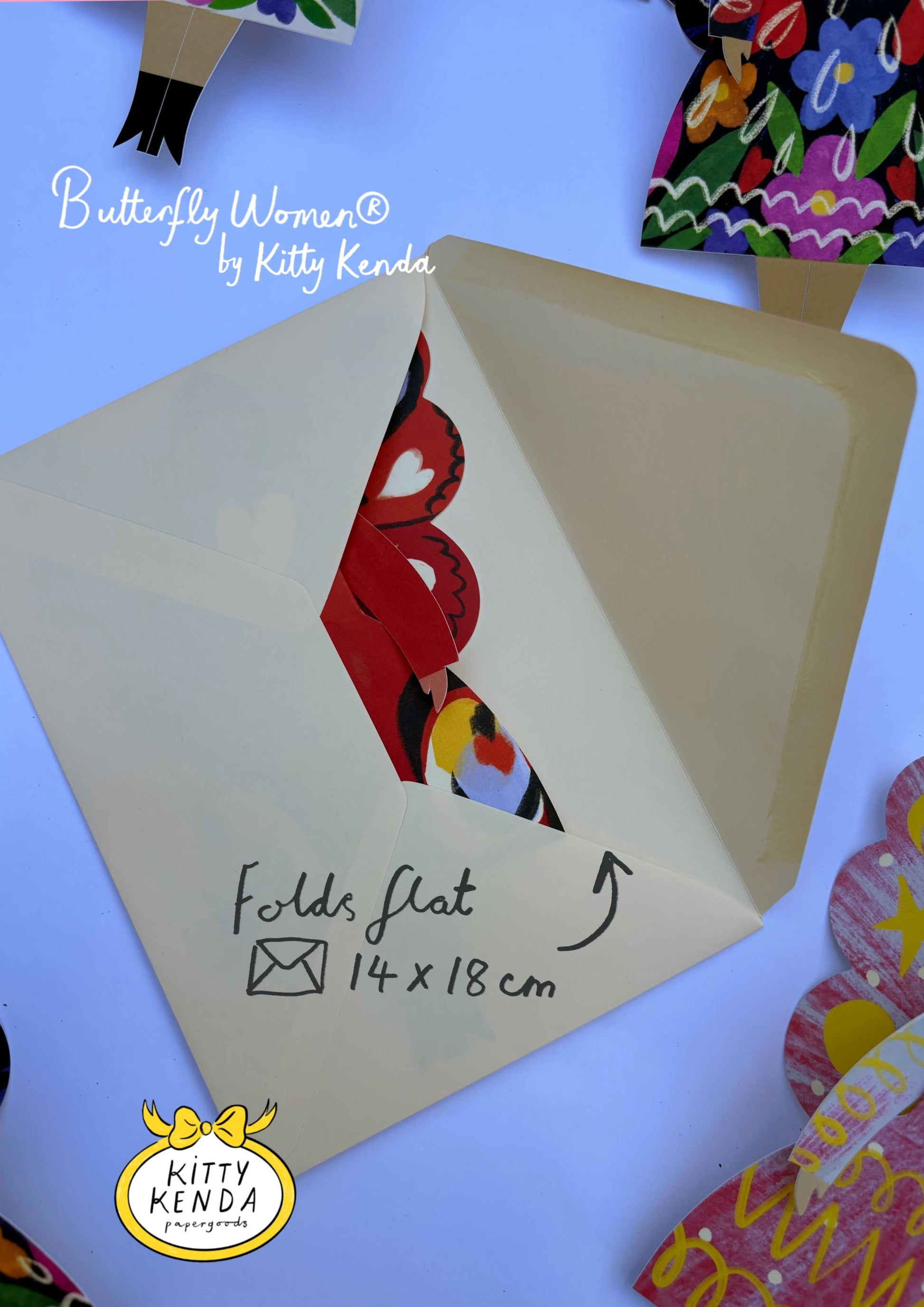 Card with butterfly design and folding instructions on a colorful background