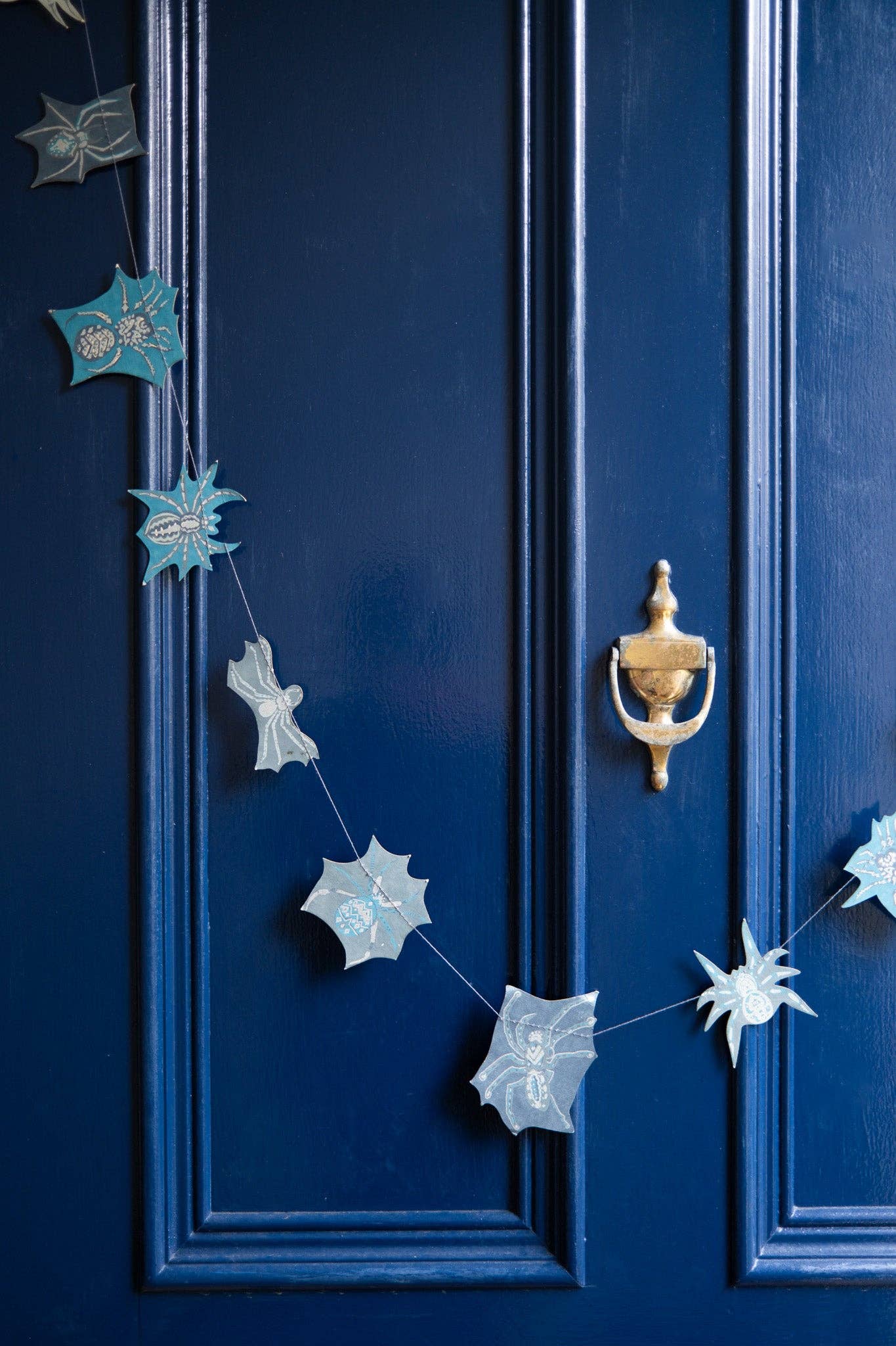 Hand-sewn recycled Halloween garland with 20 spooky screen-printed spiders