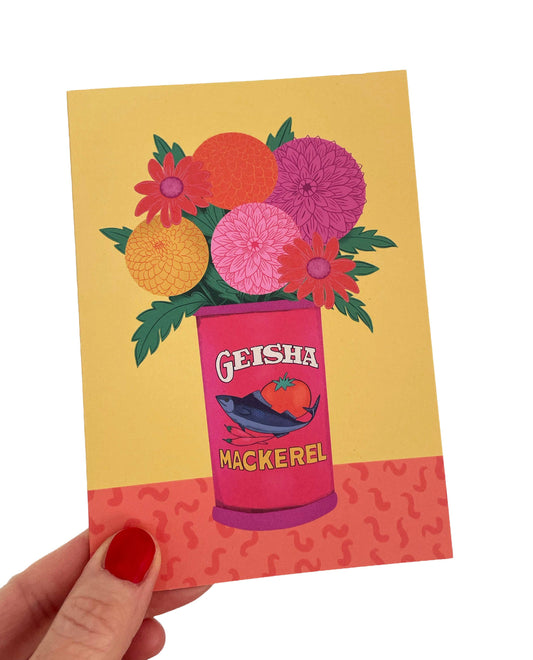 Close up of floral dahlia illustration on vintage tin greetings card