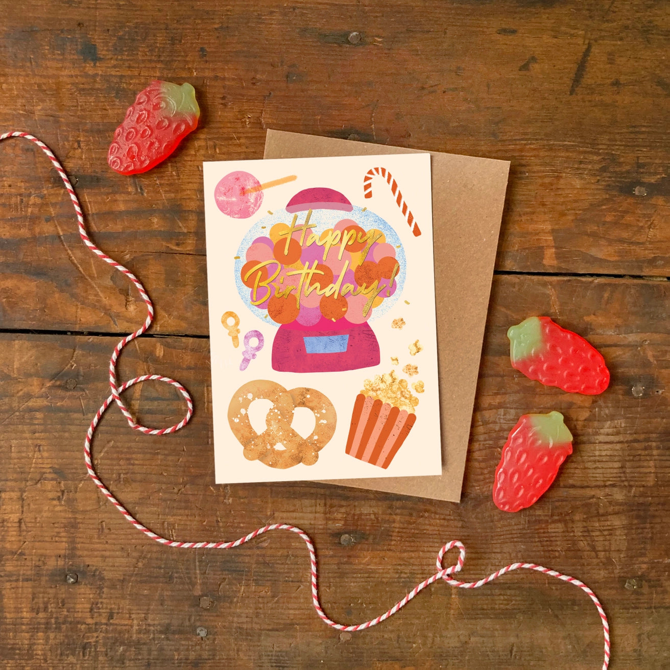 Birthday card with candy-themed illustrations by Emily Nash. Made in the UK.