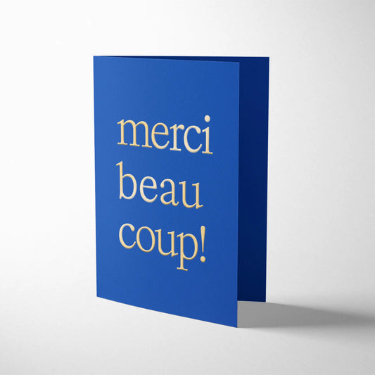 Darling Clementine French Twist Merci Beaucoup! card, letterpress printed on indigo board with gold foil details, bubblegum pink envelope, 108mm x 140mm.