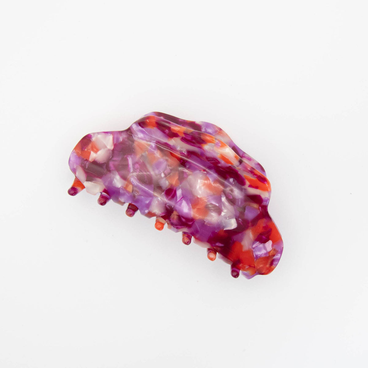 Side view of speckled frozen berry hair accessory