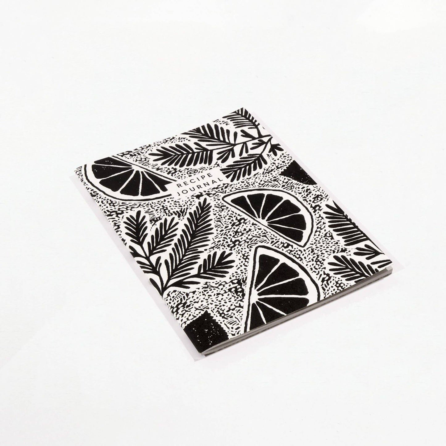 Studio Wald's Recipe Journal features a rosemary and lemon patterned cover design. Pages are designed to layout ingredients and method as well as space to draw pictures, staple photos etc. Also includes a namesake page and handy weights and measurements page at the back.