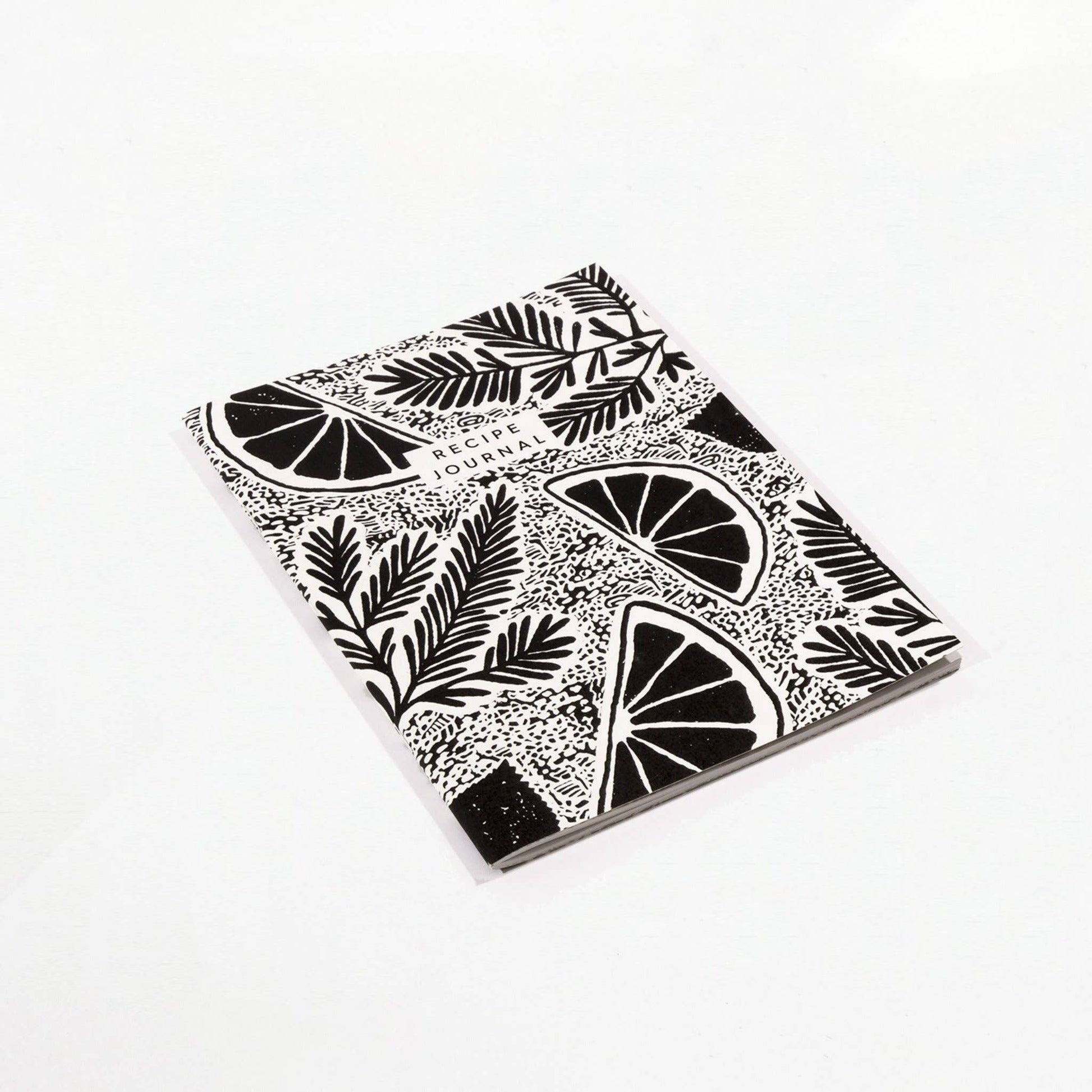 Studio Wald's Recipe Journal features a rosemary and lemon patterned cover design. Pages are designed to layout ingredients and method as well as space to draw pictures, staple photos etc. Also includes a namesake page and handy weights and measurements page at the back.