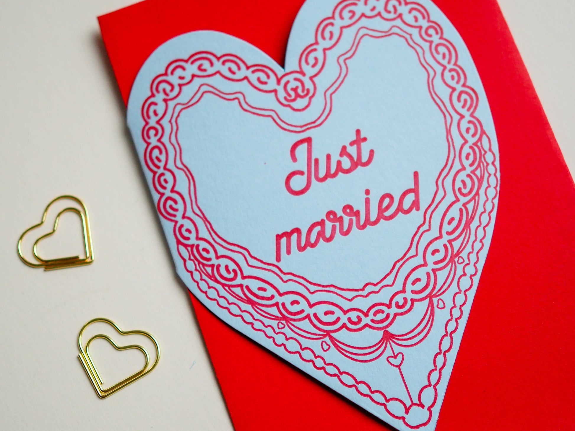 Letterpress wedding card detail showing antique print quality and envelope