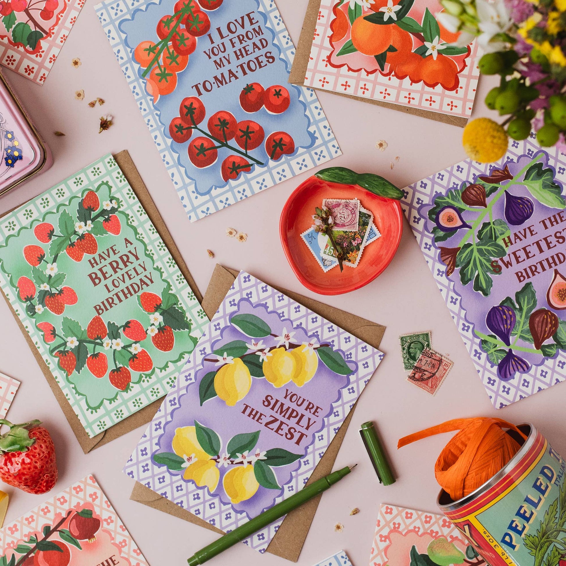 Hand drawn lettering reads 'Have the sweetest birthday'. Part of the on trend Palermo Picnic range, inspired by Italian fruits. Illustrated greeting card with tile pattern and figs illustration, printed onto premium textured card with a kraft envelope. Shown with other designs from the same Palermo collection.