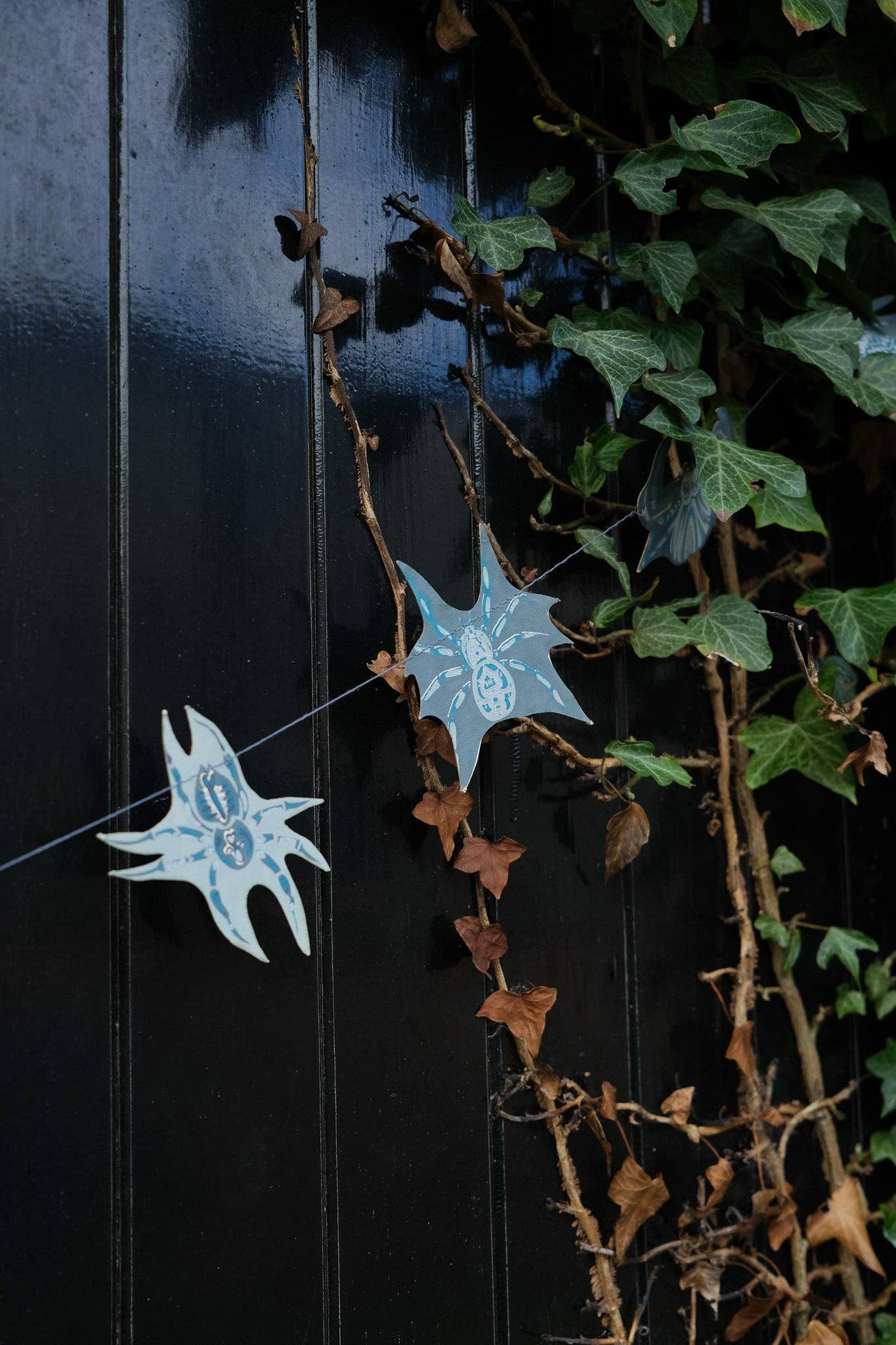 Hand-sewn recycled Halloween garland with 20 spooky screen-printed spiders