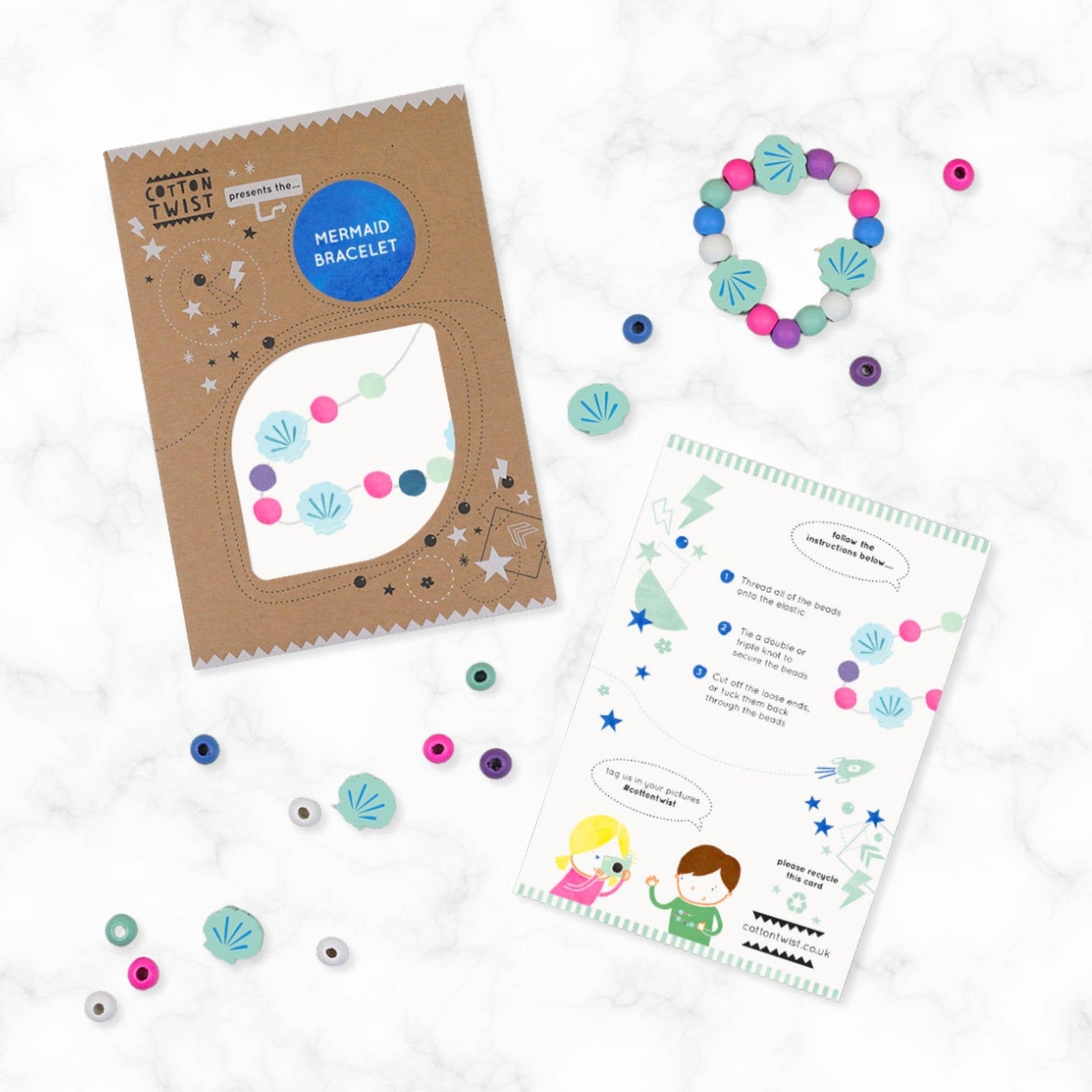 Mermaid bracelet kit with packaging, beads, and instructions on a white background