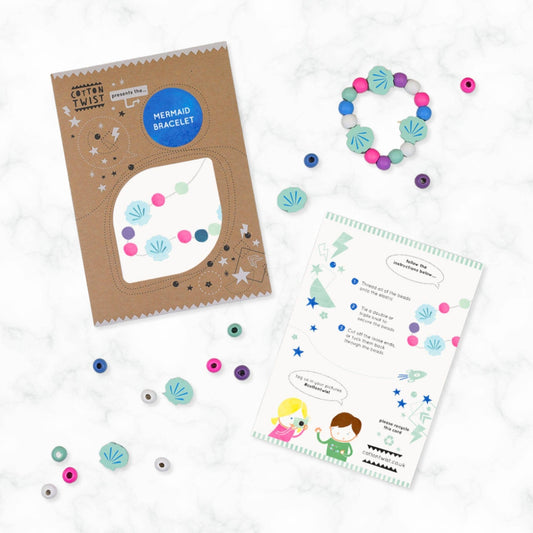 Mermaid bracelet kit with packaging, beads, and instructions on a white background