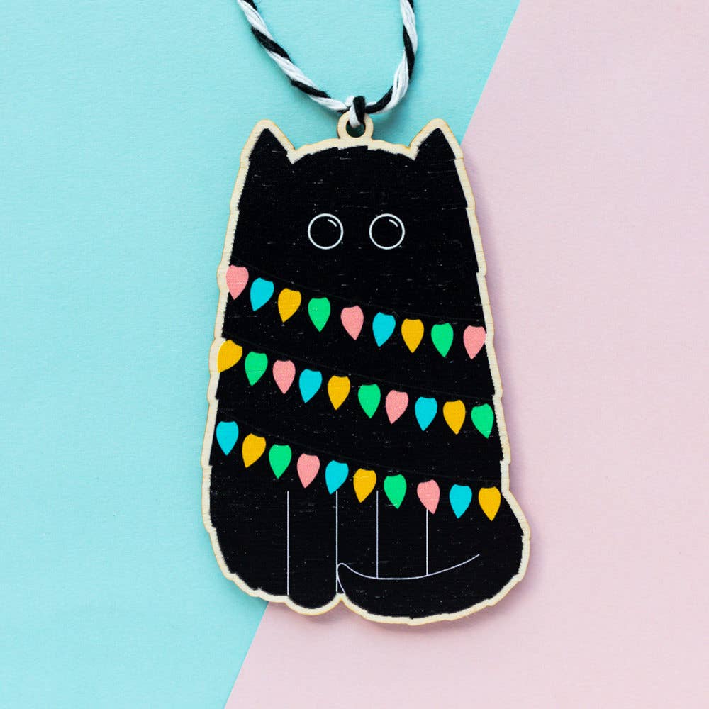 Black Cat wooden Christmas tree decoration made from sustainably certified birch plywood, with black and white bakers twine, single sided natural finish by Jeff and The Squirrel