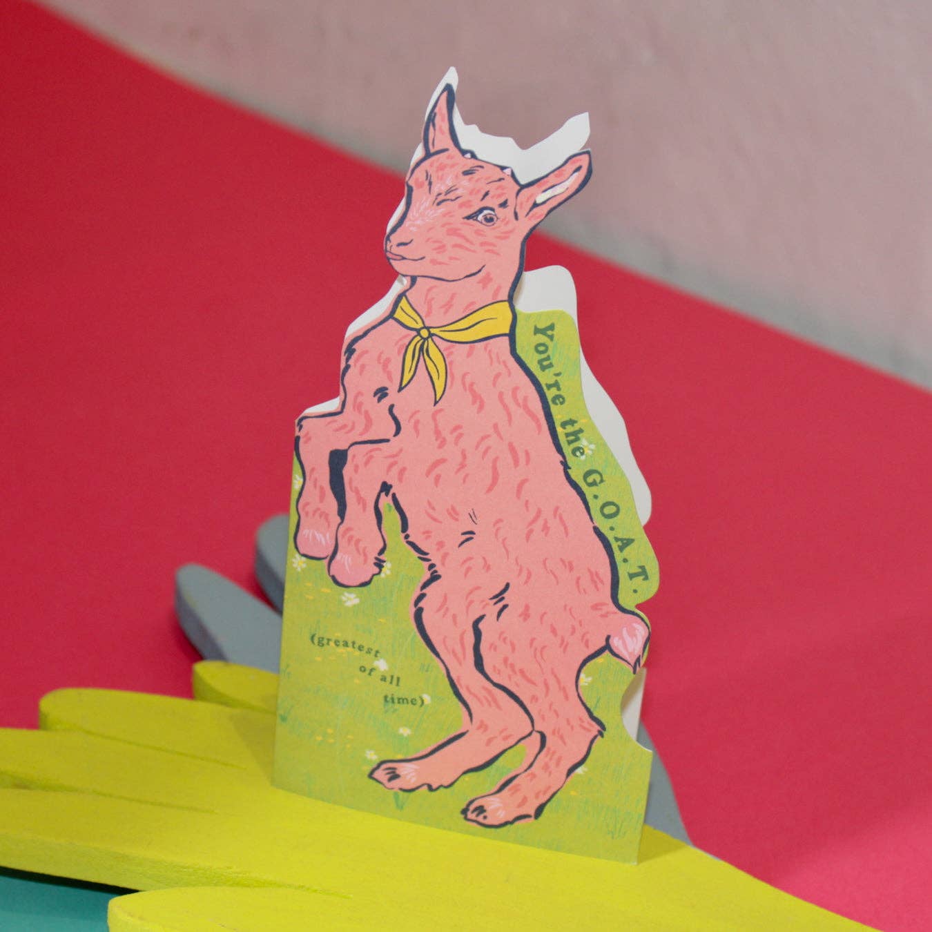 Plastic-free packaging for GOAT shaped card