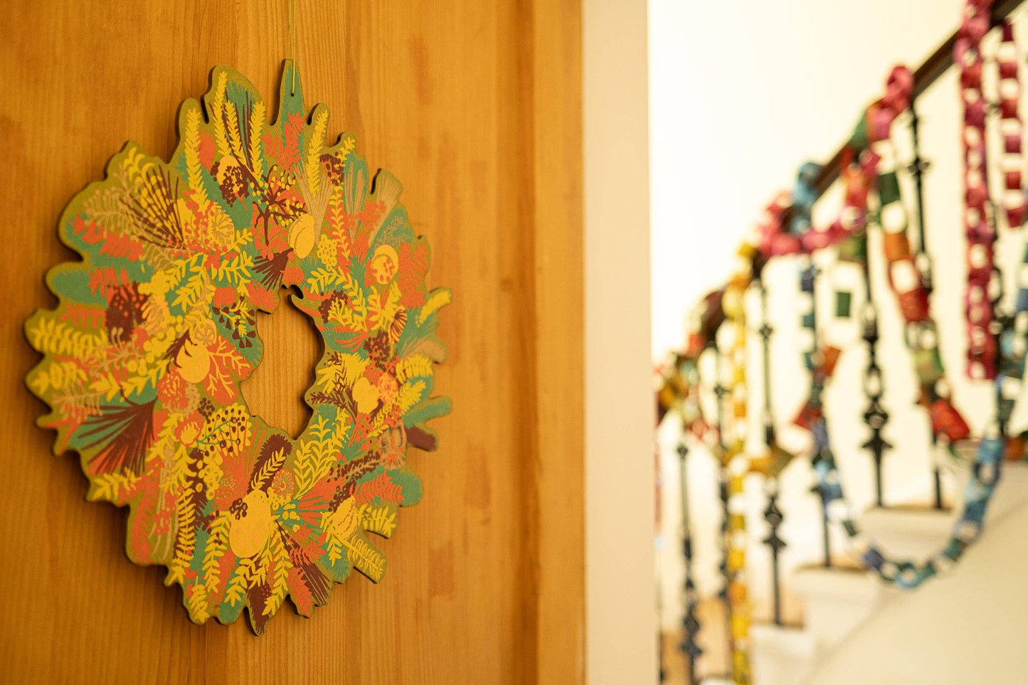 Hand-printed cotton board wreath with winter blooms, sustainable Christmas ornament