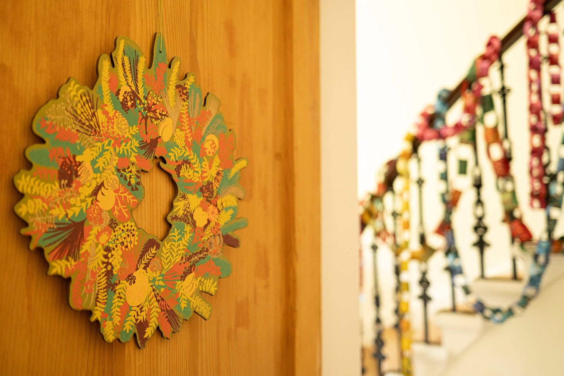 Hand-printed cotton board wreath with winter blooms, sustainable Christmas ornament