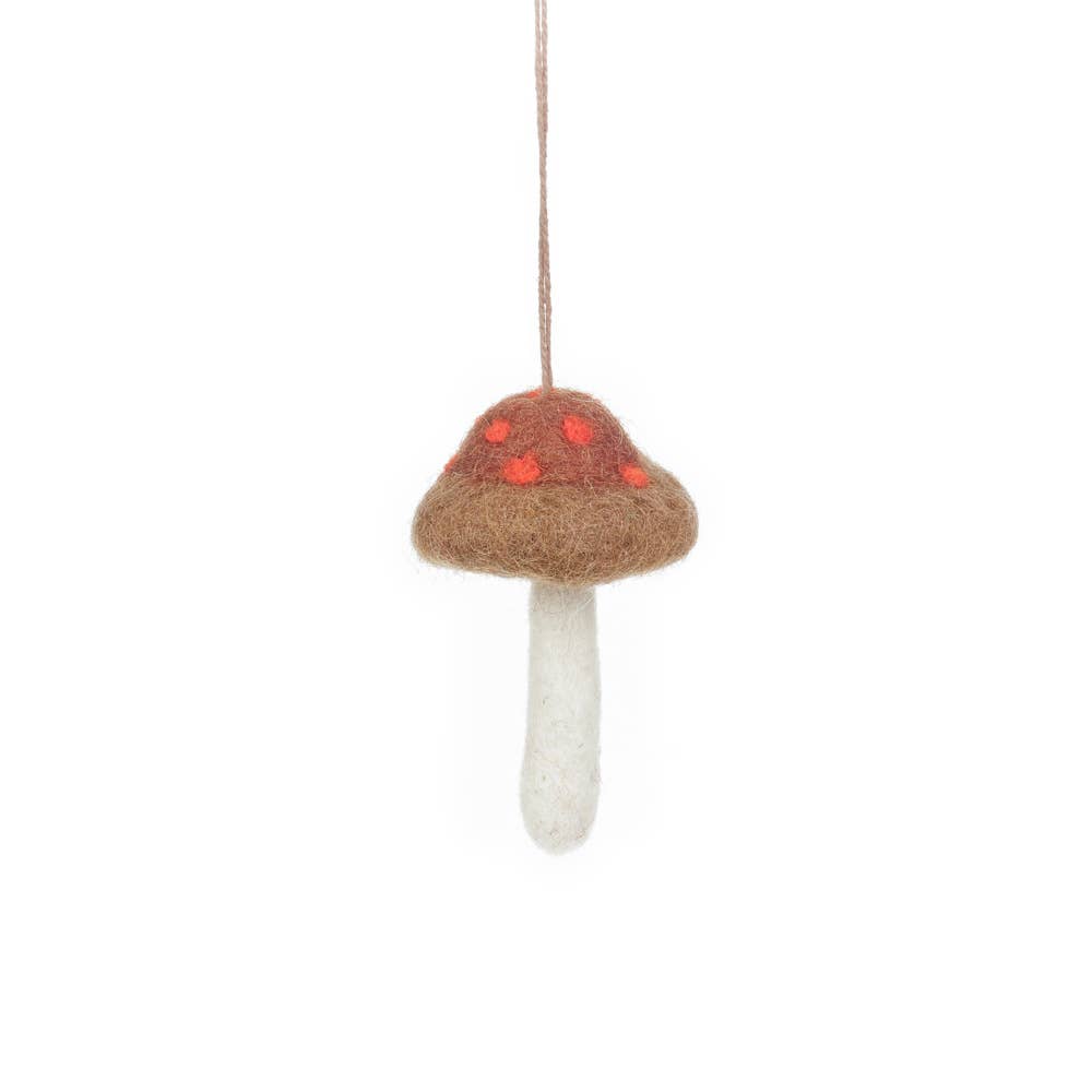 Detailing of fair trade felt mushroom ornaments