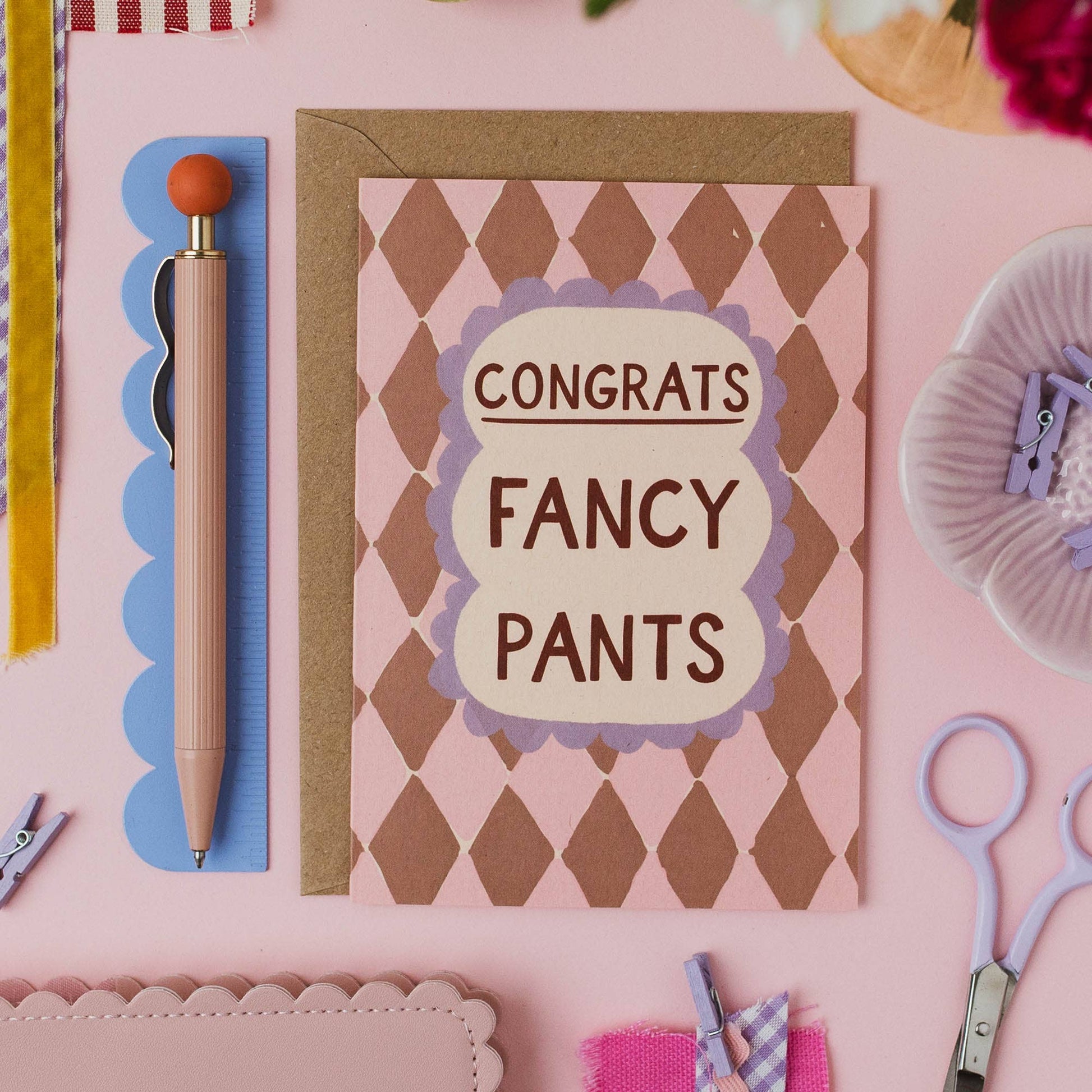 Close up of the hand-lettered congratulations card on premium GF Smith recycled board
