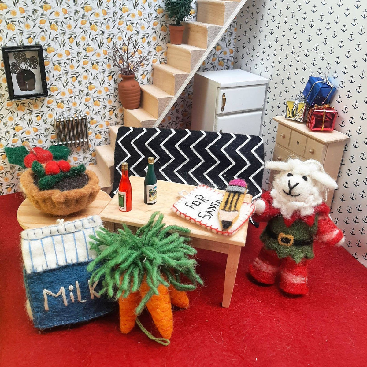 Close-up of stitched felt festive treats for Santa and Rudolph