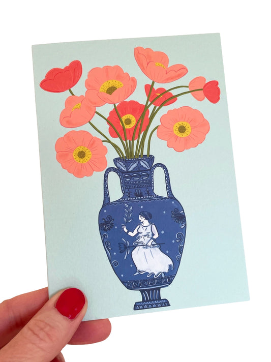 Pink poppies in a Greek inspired vase are featured on this card. From an original illustration greeting card by Su Owen.