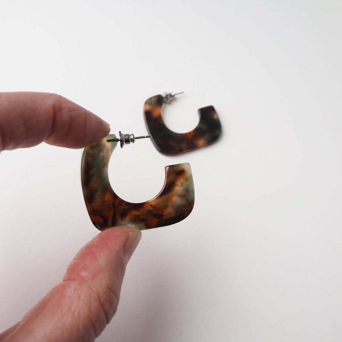 Eco-friendly cellulose acetate statement hoops close up